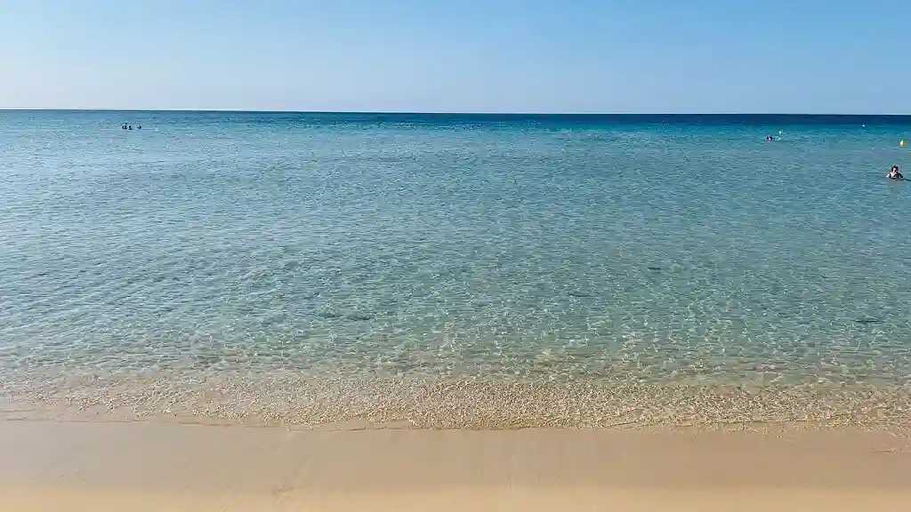 The coastline is low and sandy, characterized by dunes behind it. The beach is unique for its fine, pale sand, the finest in Salento. The south-facing coastline, and its unique location allows Pescoluse to enjoy crystal-clear water all year round. Not far from the coast are several karst caves. The area is also important from an archaeological perspective due to the presence of a dolmen and a tomb dating back to 2500 BC.